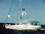 Tom's boat at the entrance to Maupiti (John Beck).